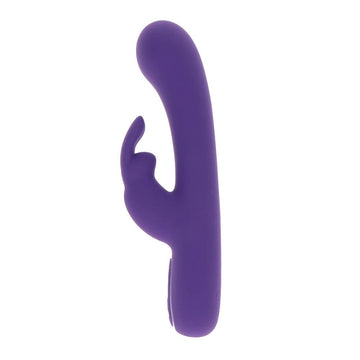 ToyJoy Love Rabbit vibrator in soft pink with dual stimulation design and textured surface for enhanced pleasure.