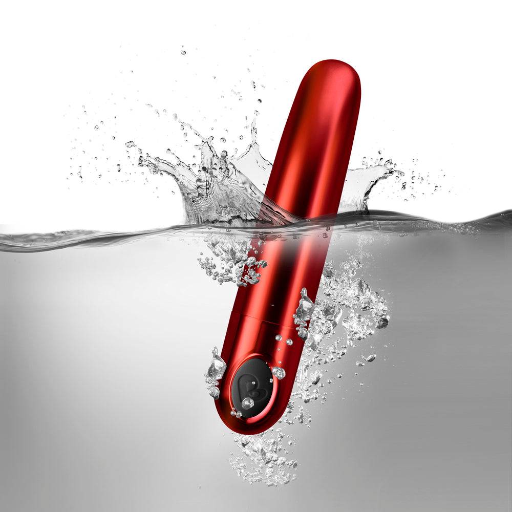 Rocks Off Ruby Caress Vibrator in a sleek, red design with smooth curves and ergonomic shape for comfortable use.