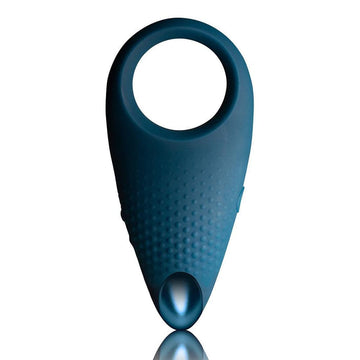Blue Rocks Off Empower MenX cock ring displayed on a neutral background, showcasing its sleek design and texture.