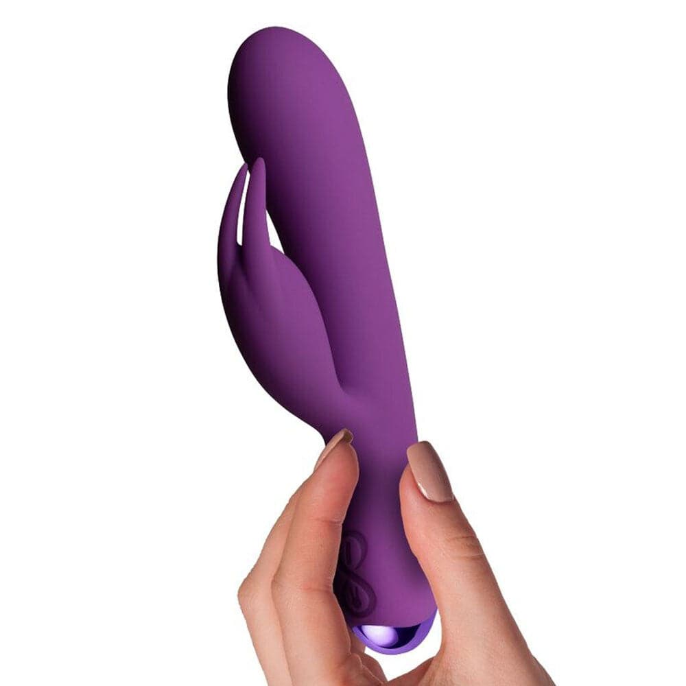 Rocks Off Flutter Rabbit Lila, a purple silicone vibrator with rabbit ears and a sleek design, ideal for intimate pleasure.