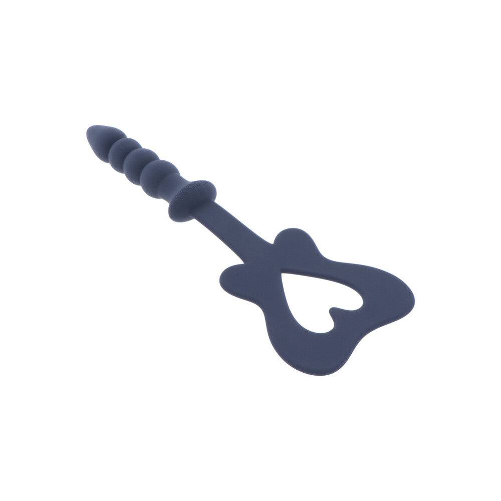 Taboom silicone paddle and plug set, featuring a sleek design and vibrant colors for playful exploration.