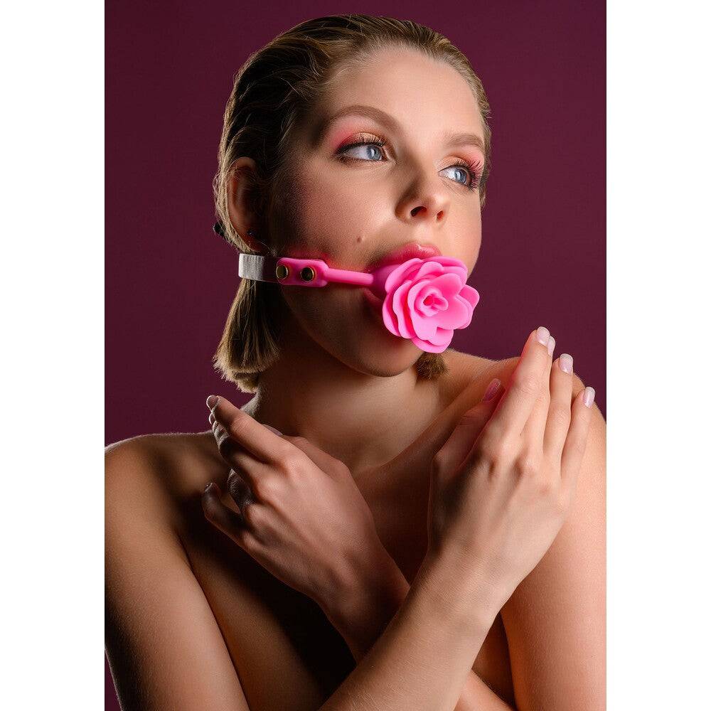 Taboom Malibu Rose Ball Gag by Toy Joy, featuring a soft floral design with a comfortable silicone ball for restraint play.