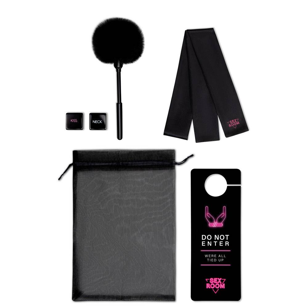 Dream Toys Sexrum Vibe Kit featuring various colorful vibrators and accessories arranged on a soft surface.