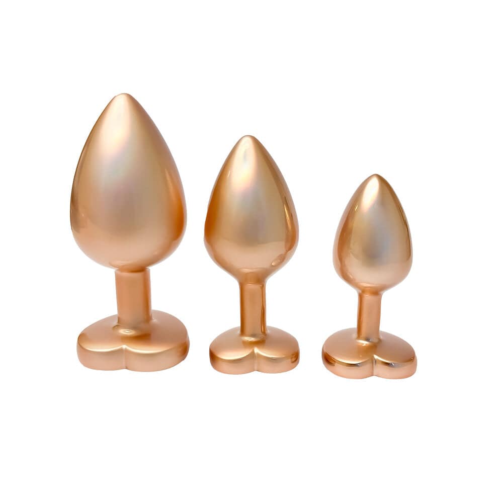 Gleaming Love Pearl Gold Butt Plug Set by Dream Toys featuring elegant pearl design and smooth gold finish.