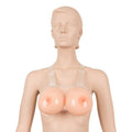 Cottelli Collection 1200g silicone breasts with realistic texture, designed for strap-on use in intimate settings.