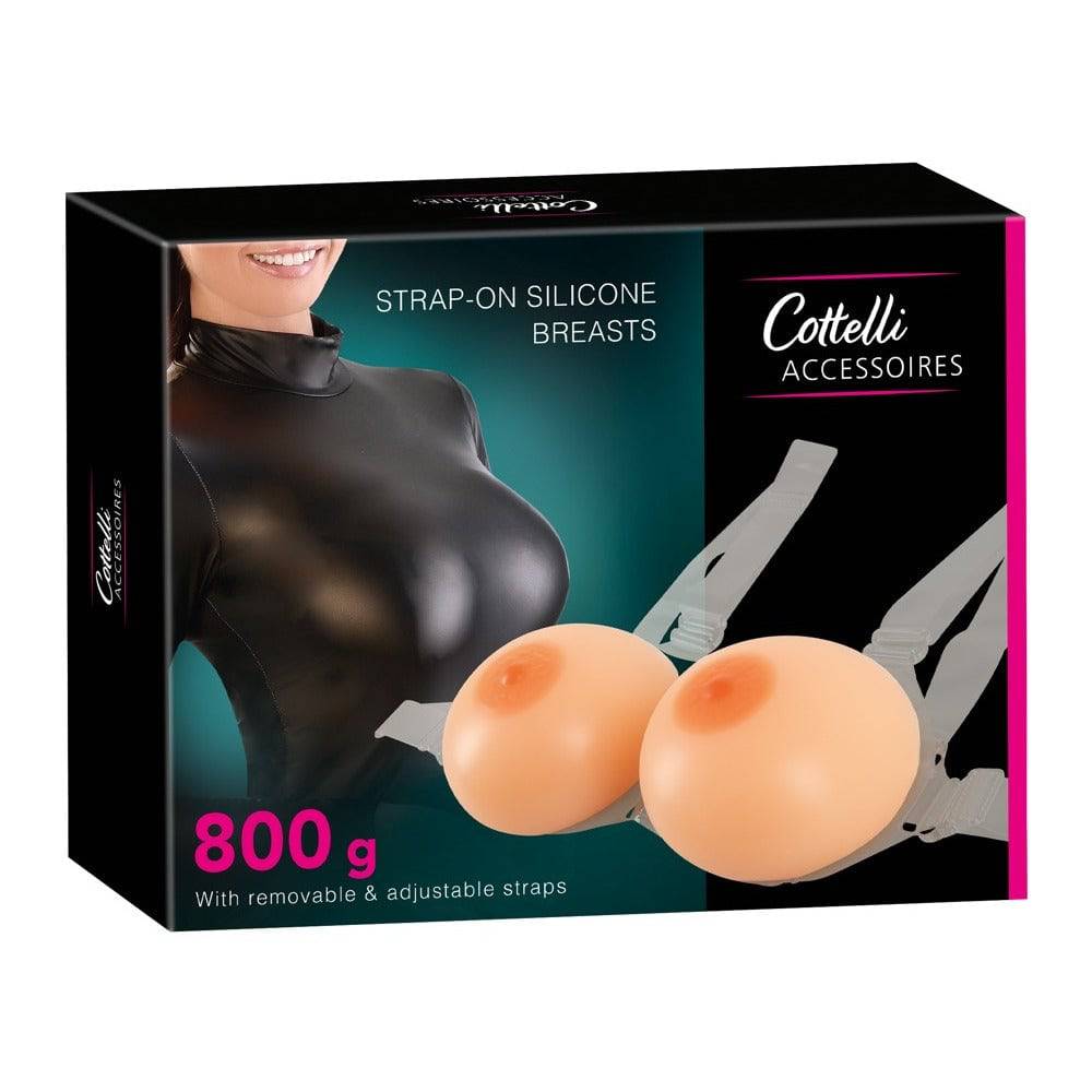Cottelli Collection 800g silicone strap-on breasts in a realistic skin tone, showcasing texture and detail.