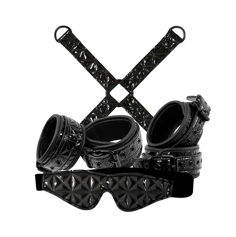 NS Novelties Sinful Bondage Kit Svart featuring black restraints, cuffs, and accessories for versatile play.