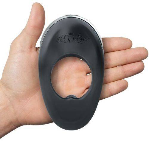 Hot Octopuss Atom Plus vibrating cock ring in sleek black design, showcasing its unique shape and textured surface.