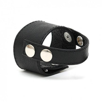 Rimba Läder Cock Ring Strap in black leather with adjustable buckle and sleek design for comfort and style.