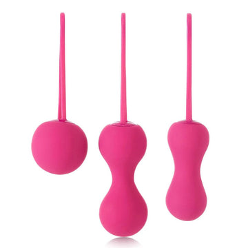 Je Joue Ami Skittles in vibrant fuchsia, featuring smooth, textured surfaces for versatile pleasure.