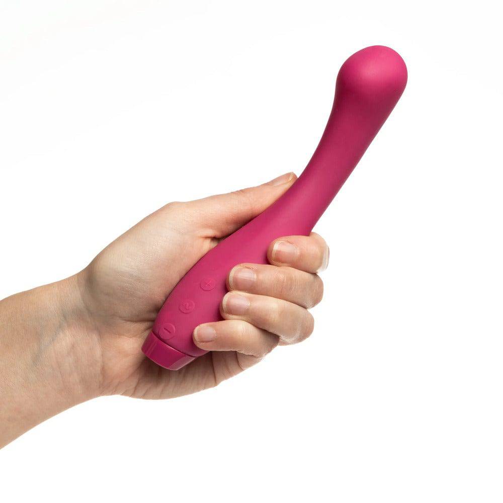 Fuchsia Je Joue Juno Sleek G-Spot vibrator showcasing its smooth, curved design and ergonomic shape.