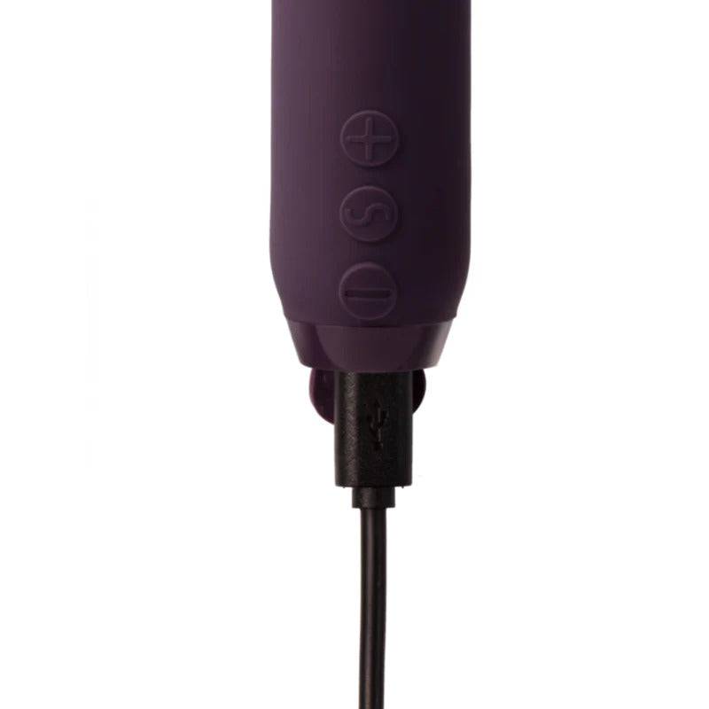 Je Joue Duet multi-surfaced bullet vibrator in vibrant Lila color, showcasing its sleek design and textured surfaces.