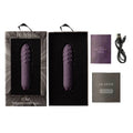 Je Joue Duet multi-surfaced bullet vibrator in a vibrant lila color, showcasing its sleek design and textured surfaces.