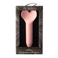 Je Joue I Play Love Bullet Vibrator in soft pink with sleek design and textured surface for enhanced pleasure.