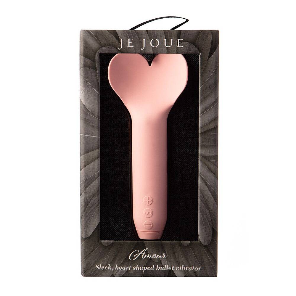 Je Joue I Play Love Bullet Vibrator in soft pink with sleek design and textured surface for enhanced pleasure.