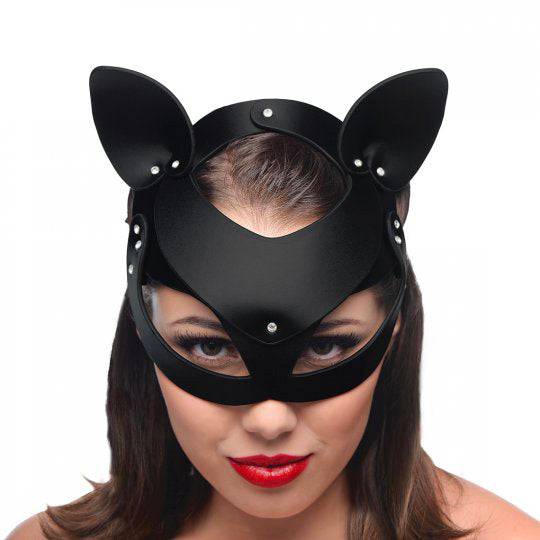 Black leather cat mask from XR Brands, featuring playful ears and adjustable straps for a secure fit.