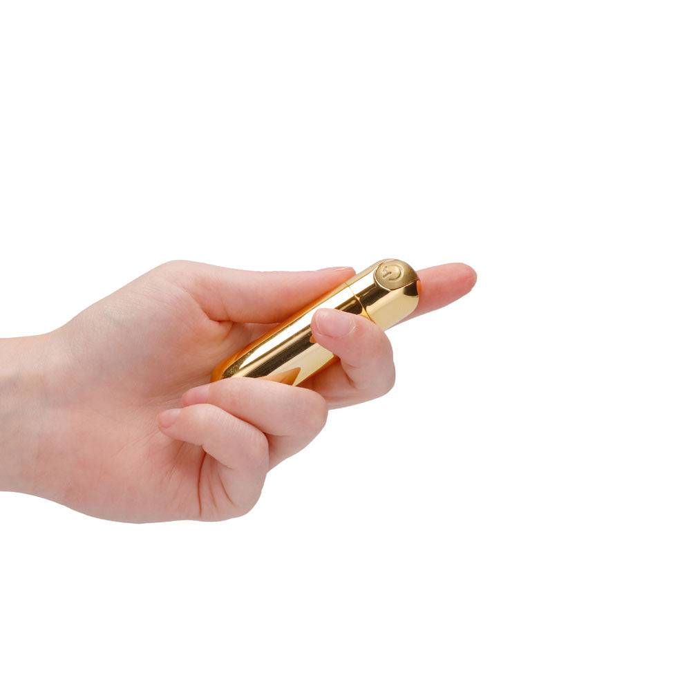 Shots Toys rechargeable gold bullet vibrator with 10 speed settings, elegantly designed and compact for discreet use.