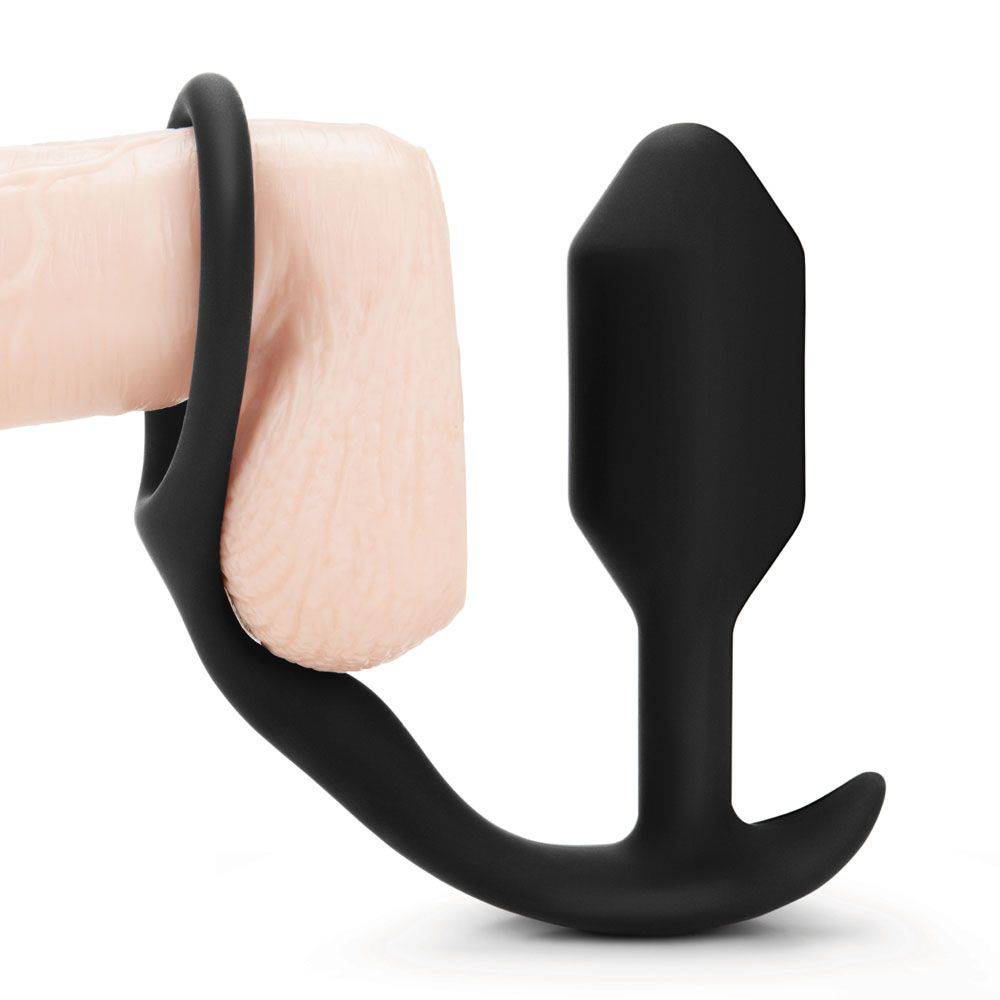B-Vibe Snug And Tug anal plug and cock ring set in black, showcasing smooth silicone design and versatile shapes.