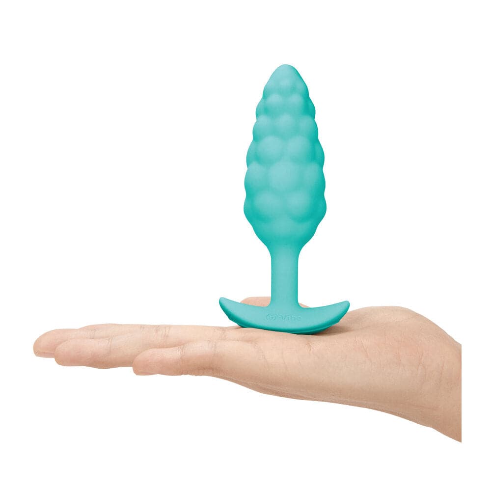 B-Vibe Bump textured butt plug in a sleek design, showcasing its unique shape and smooth silicone material.