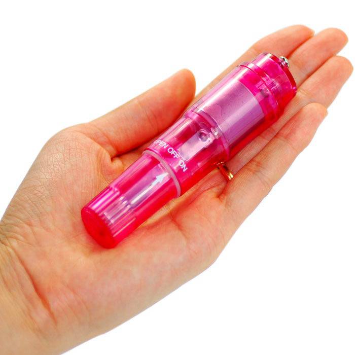 Rosa kraftfull Pocket Mini Vibrator in vibrant pink, compact design with textured surface for enhanced pleasure.