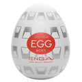 Tenga Boxy Egg Masturbator with unique texture design in a sleek, egg-shaped case for discreet storage and use.