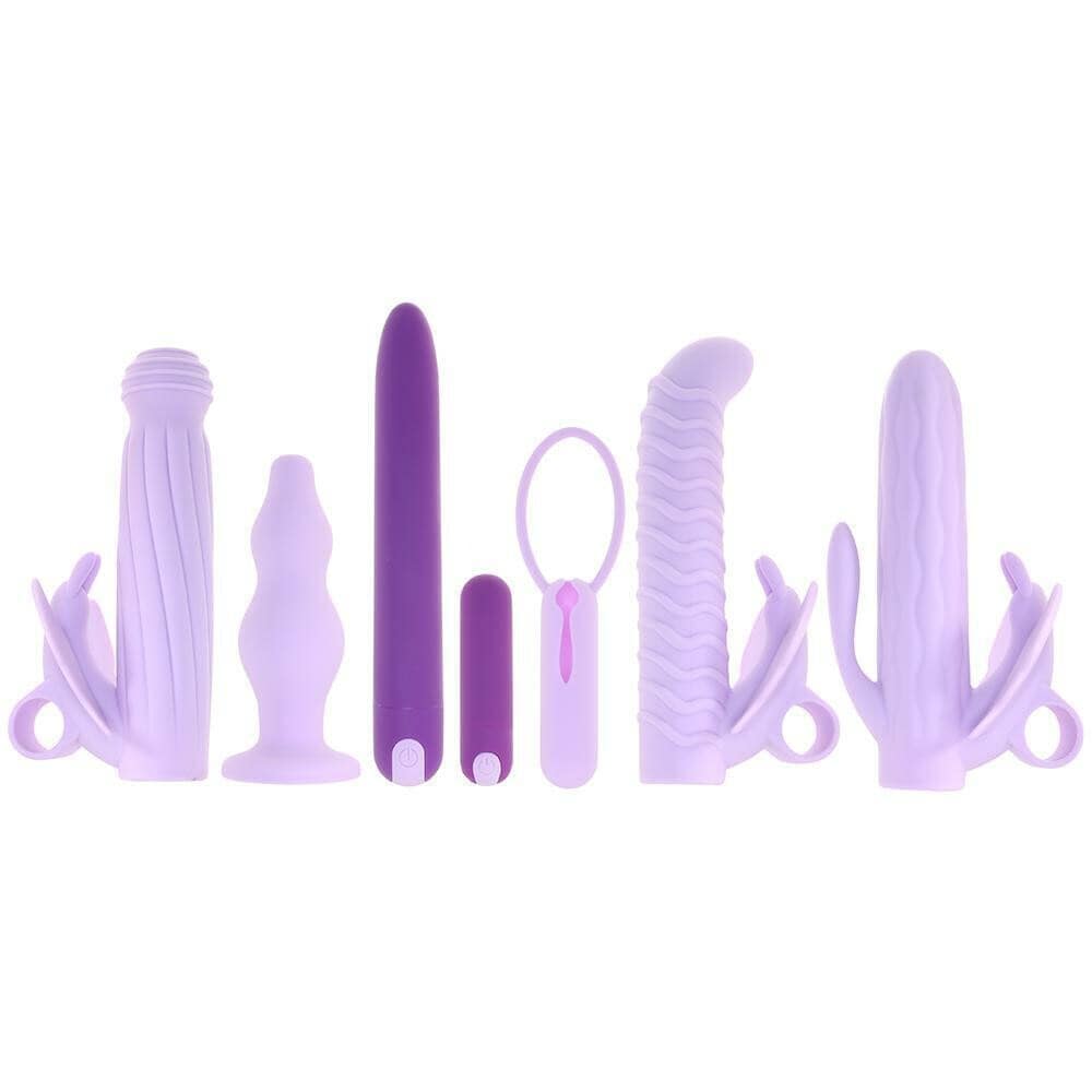 Evolved Lilac Desires rechargeable silicone butterfly kit with multiple attachments and a sleek, modern design.