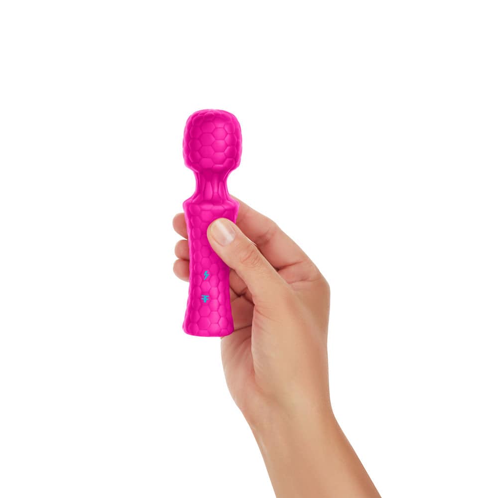 FemmeFunn Ultra Wand Mini in sleek design, featuring a soft silicone head and ergonomic handle for comfortable use.