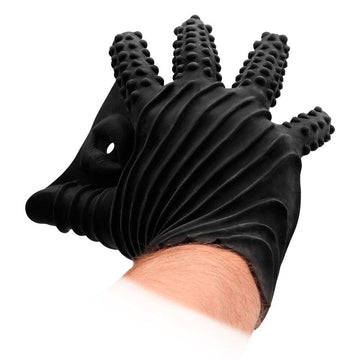 Fist It Svart textured masturbation glove by Shots Toys, featuring a black design with intricate surface details.