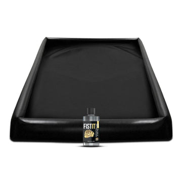 Shots Toys Fist It inflatable toy blanket and lubricant, featuring a sleek black design for enhanced play.