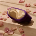 Lelo Sona 2 in purple, a sleek clitoral vibrator with a curved design and soft silicone finish.