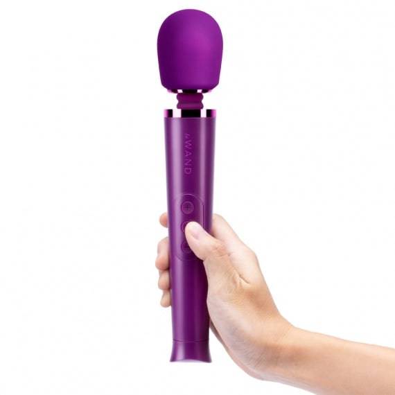 Le Wand Petite rechargeable vibrating massager in dark cherry color, showcasing its sleek design and ergonomic shape.