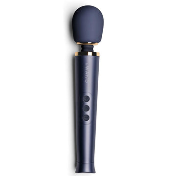 Le Wand Petite rechargeable vibrating massager in navy blue, featuring a sleek design and ergonomic handle.