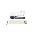 Le Wand Petite rechargeable vibrating massager in navy, featuring a sleek design and ergonomic handle for comfort.