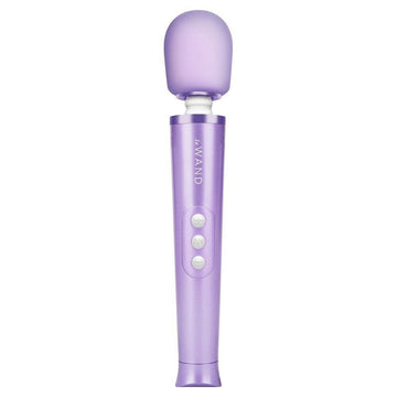 Le Wand Petite rechargeable violet vibrating massager with a sleek design and textured surface for targeted relief.