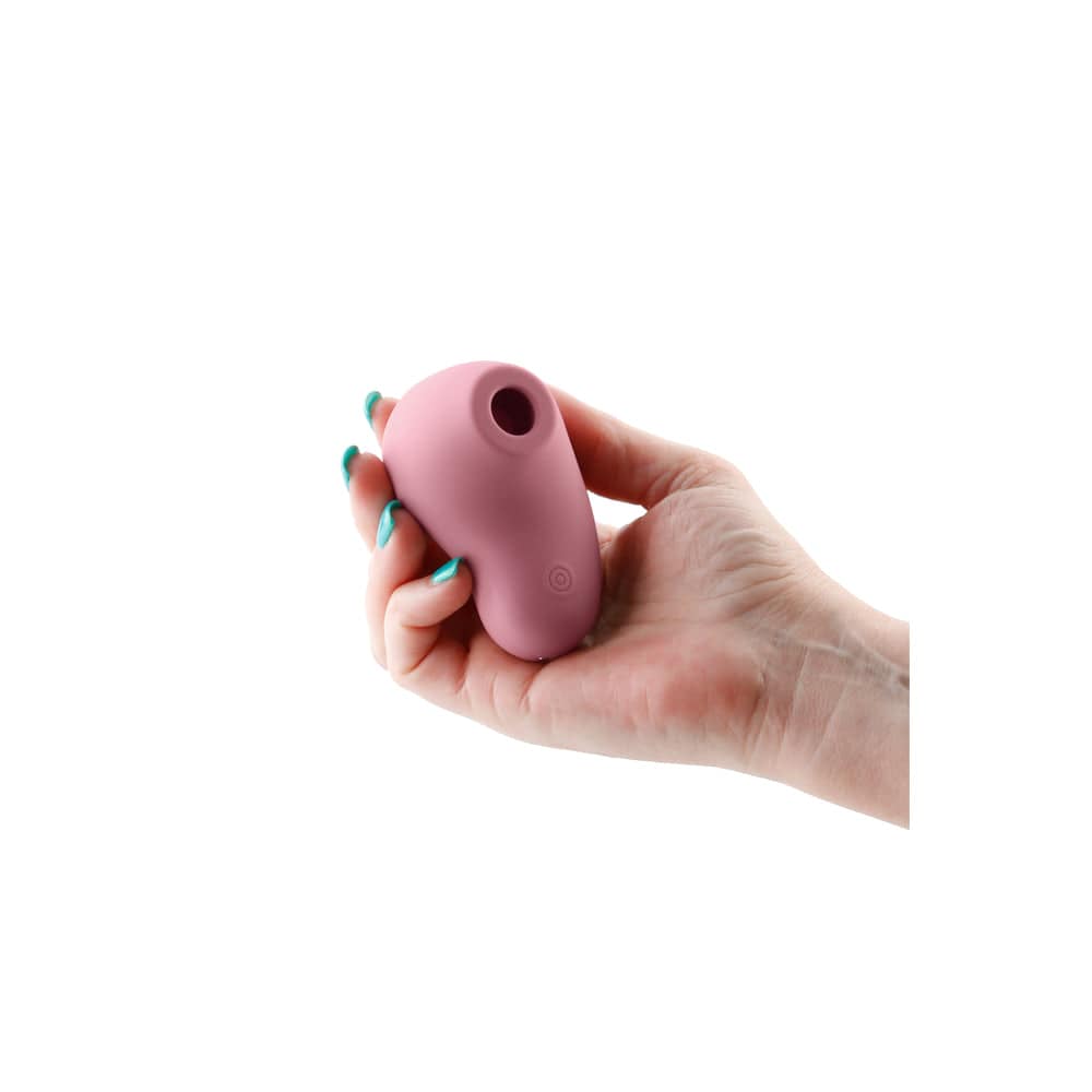 NS Novelties Desire Tresor Klitoris Vibe in vibrant pink with ergonomic design and textured surface for enhanced pleasure.