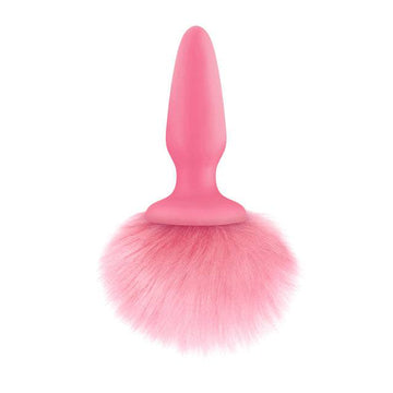 Pink bunny tail butt plug by NS Novelties featuring a fluffy tail and smooth design for playful, intimate experiences.