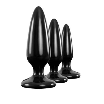 NS Novelties Renegade Pleasure Plug 3pc Trainer Kit featuring various sizes of silicone plugs in a sleek design.