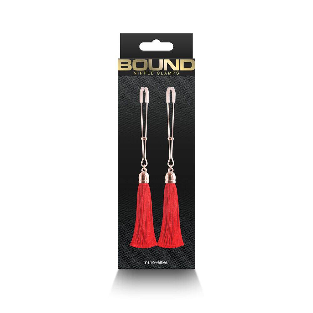 NS Novelties Bound Nipple Clamps with red tassels, featuring adjustable clips and intricate design for enhanced stimulation.