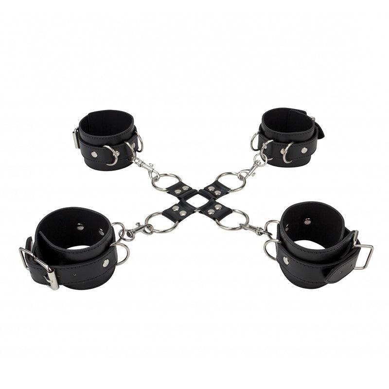 Shots Toys leather hand and leg cuffs, featuring a sleek black design with sturdy buckles for secure restraint.