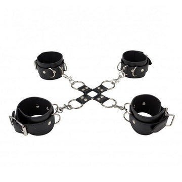 Shots Toys leather hand and leg cuffs, featuring a sleek black design with sturdy buckles for secure restraint.
