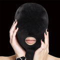 Black velvet mask with mouth opening from Shots Toys, featuring soft fabric and sleek design for comfortable wear.