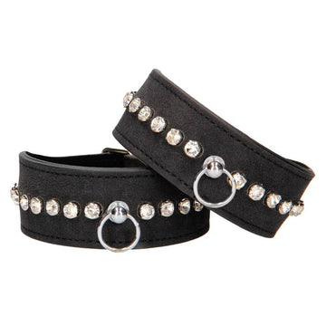 Shots Toys ankle cuffs adorned with diamond studs, featuring a sleek black design for stylish restraint.