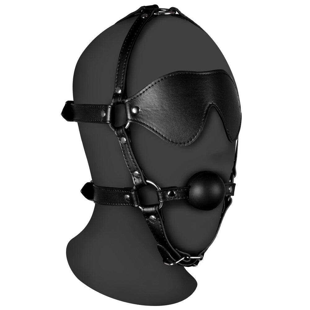 Shots Toys Ouch Xtreme Harness featuring an eye mask and sturdy ball gag in black, designed for sensory play.