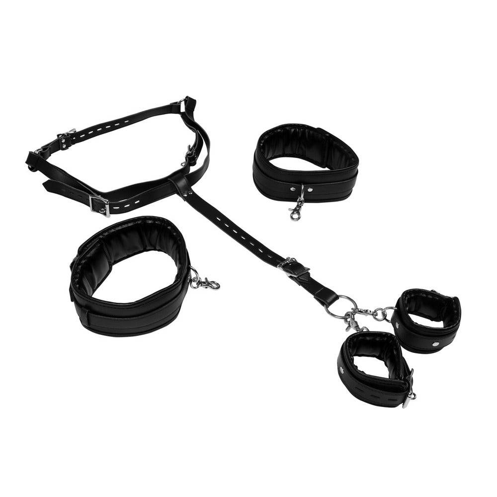 Shots Toys body harness with thigh and hand cuffs in black, featuring adjustable straps and durable metal hardware.