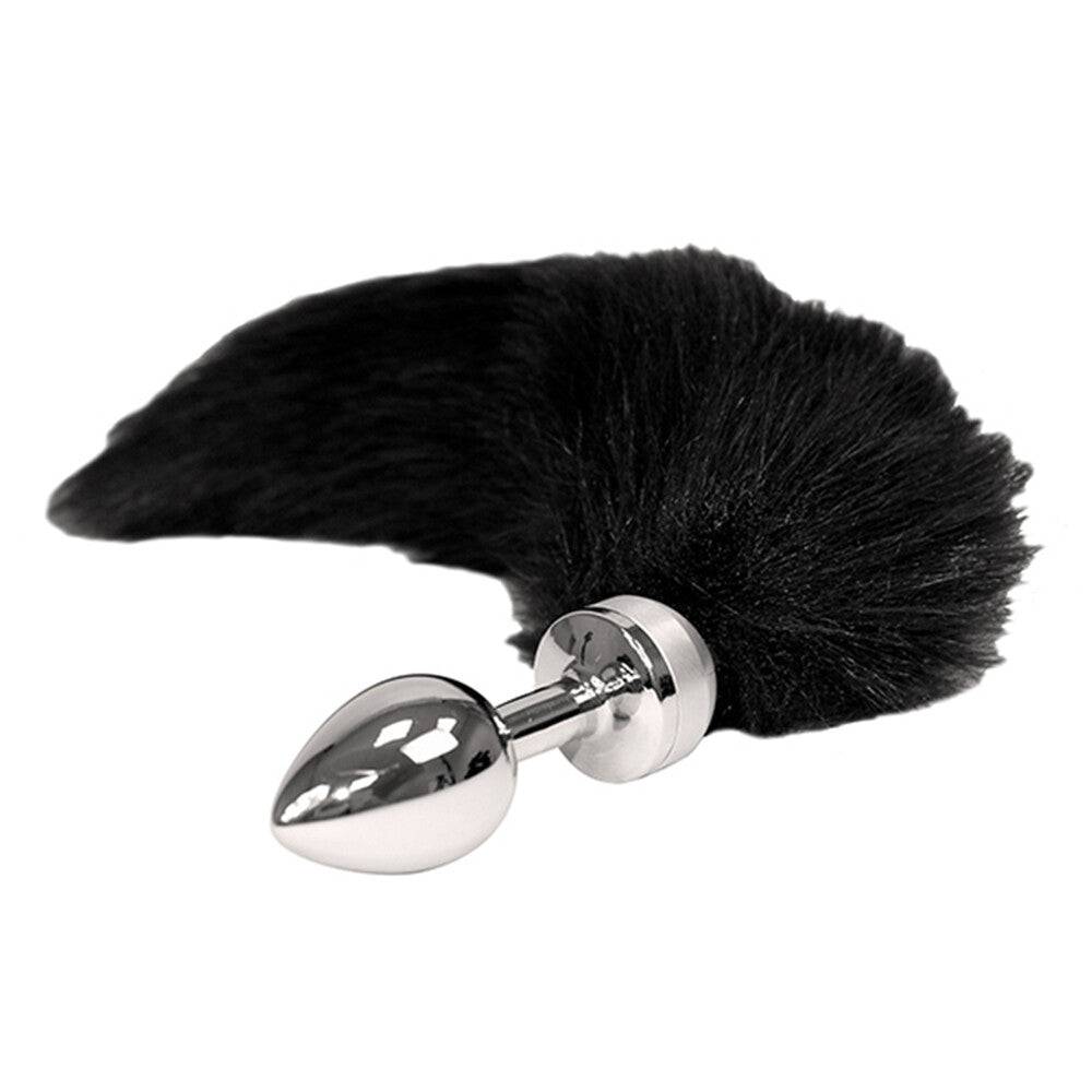 Rimba Liten Butt Plug with black tail, featuring a smooth design and playful furry accent for added fun.