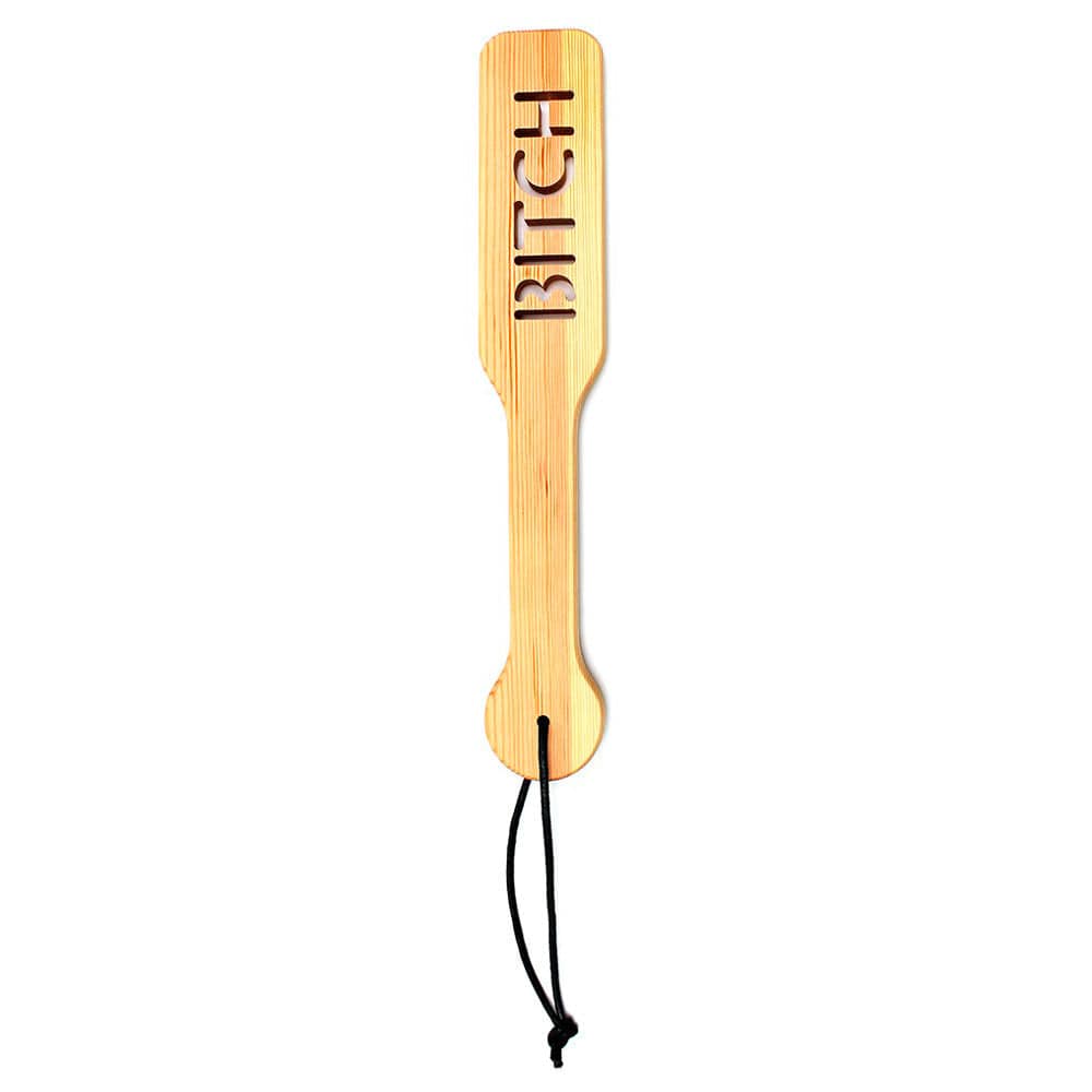 Wooden paddle by Rimba, featuring a smooth finish and ergonomic handle for comfortable grip during use.