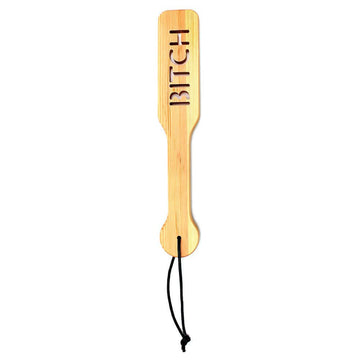 Wooden paddle by Rimba, featuring a smooth finish and ergonomic handle for comfortable grip during use.
