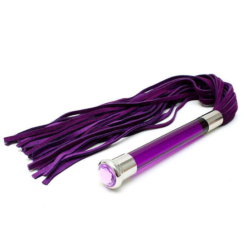 Rimba Lila flogger in suede with glass handle and crystal accents, showcasing elegant design and craftsmanship.