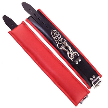 Rouge Garments red padded handled man’s cuffs with trim, showcasing a stylish and functional design.