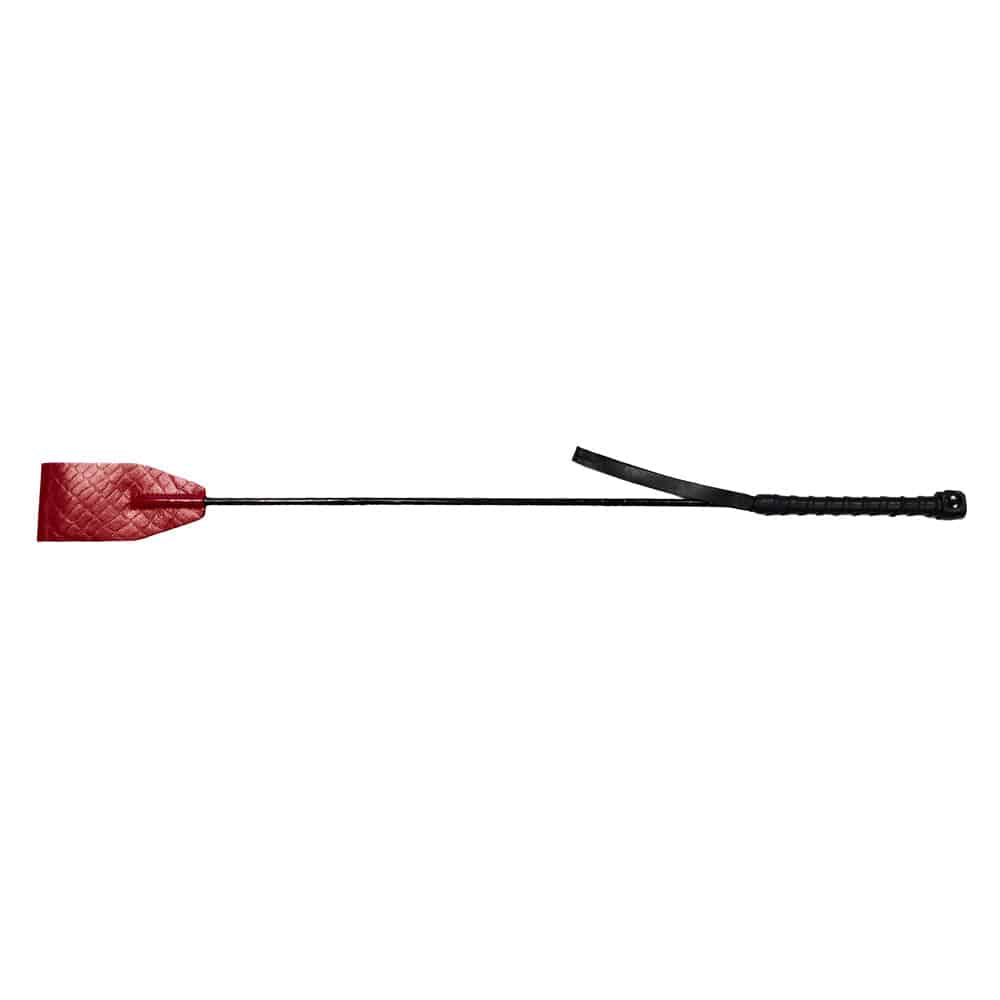 Rouge Garments croc print riding crop with a sleek black design and textured handle, perfect for equestrian use.